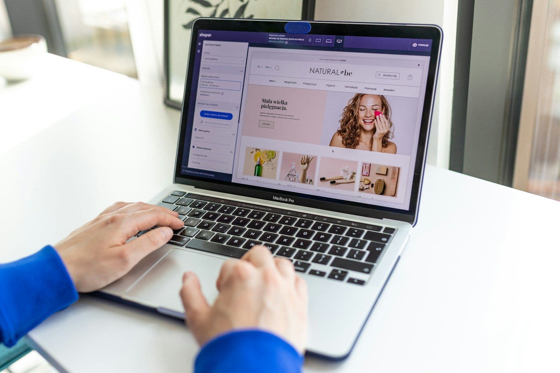 An e-commerce manager editing an online store on a laptop